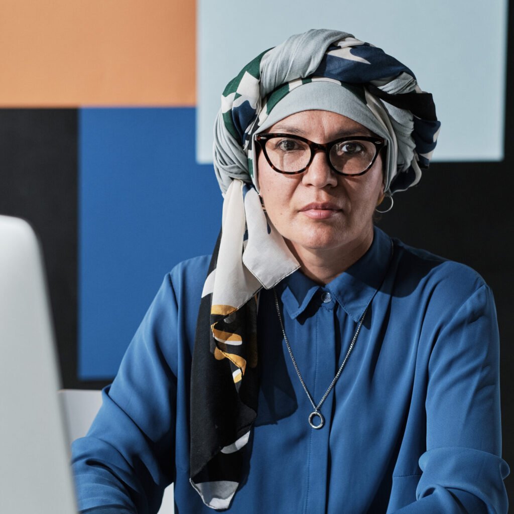 Muslim Businesswoman Typing On Computer HZYXD5F Scaled 1 1024x1024